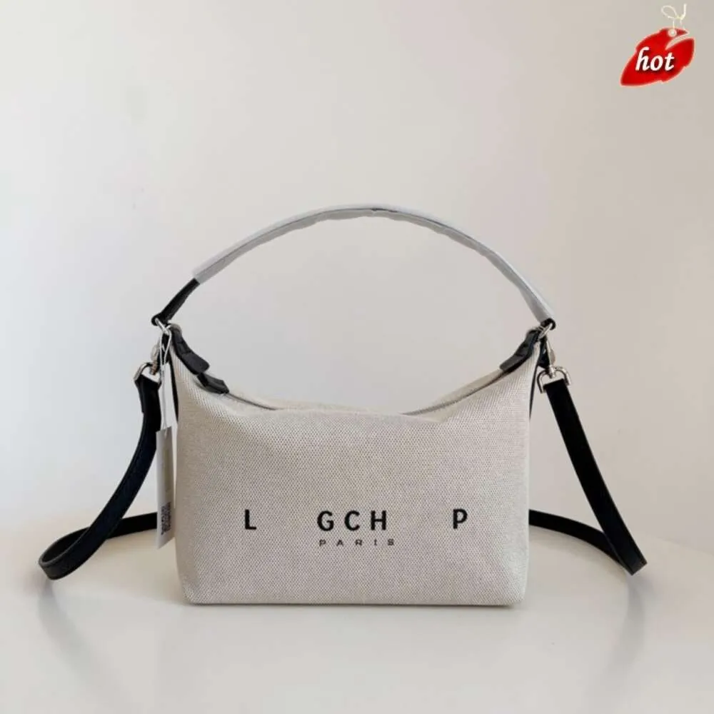 Factory Source High Quality Handbags Is High New French Canvas Tofu Bag Lunch Box Single Shoulder Underarm Stick Crossbody Cow Horn