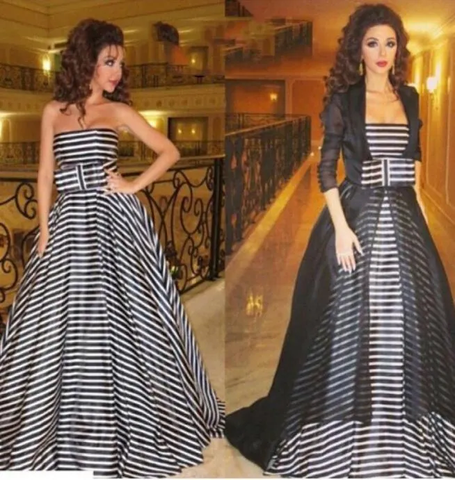 Vestidos de celebridades em preto e branco 2015 inspirados em vestidos de Myriam Fares com jaqueta preta transparente e fita de laço 1068582