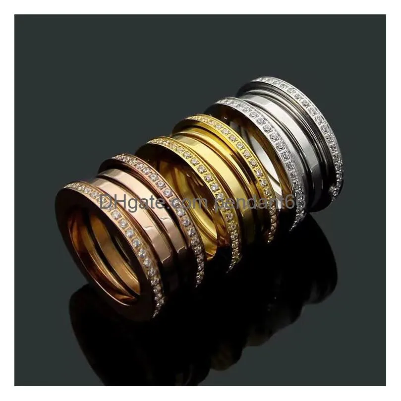 Wedding Rings 10Mm Wide 316L Titanium Steel Couple Ring For Men Women Classic Luxury Spring Design Crystal High Quality Electroplate Dhqvr