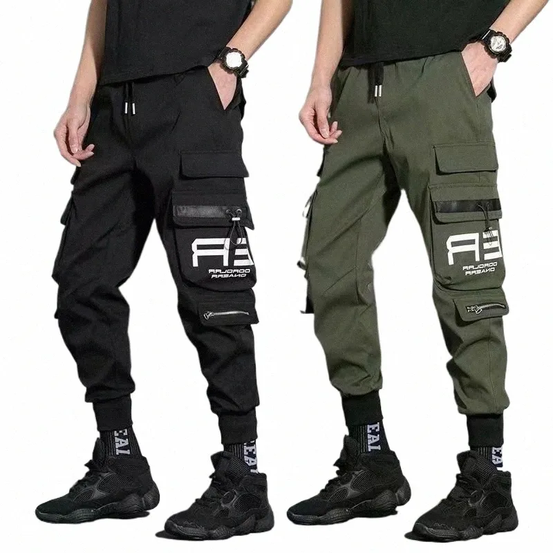 Mince Streetwear Pantalons décontractés Hommes Ribbs Harem Pantalon de jogging Homme Slim Fit Printemps Pantalon Cargo Multi-poches Femmes Pantalon J9 R4ob #