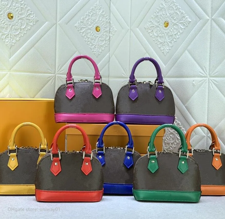 Modedesigner mini kvinna väska på handväska axelväskor skal stil kvinnor handväska med blommor bokstäver