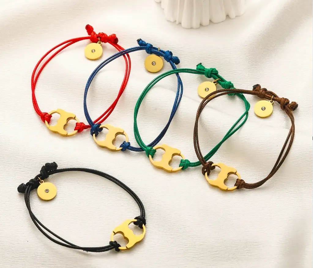 Divers créateurs corde noire bracelets de charme femmes bracelet en acier inoxydable matériel d'or corde à main rouge marron bleu vert couleur double T lettre estampillée bijoux cadeau