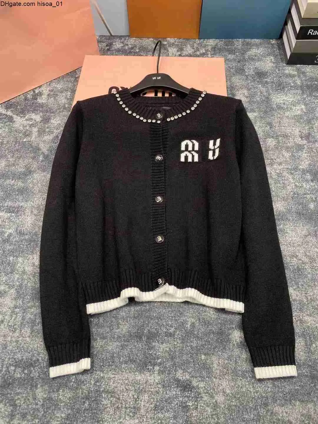 Cardigan Miui Designer Sweter damskie damskie włosy moda żeńska jesienna odzież panie białe luźne długie rękaw eleganckie swobodne najwyższe rozmiary s m l