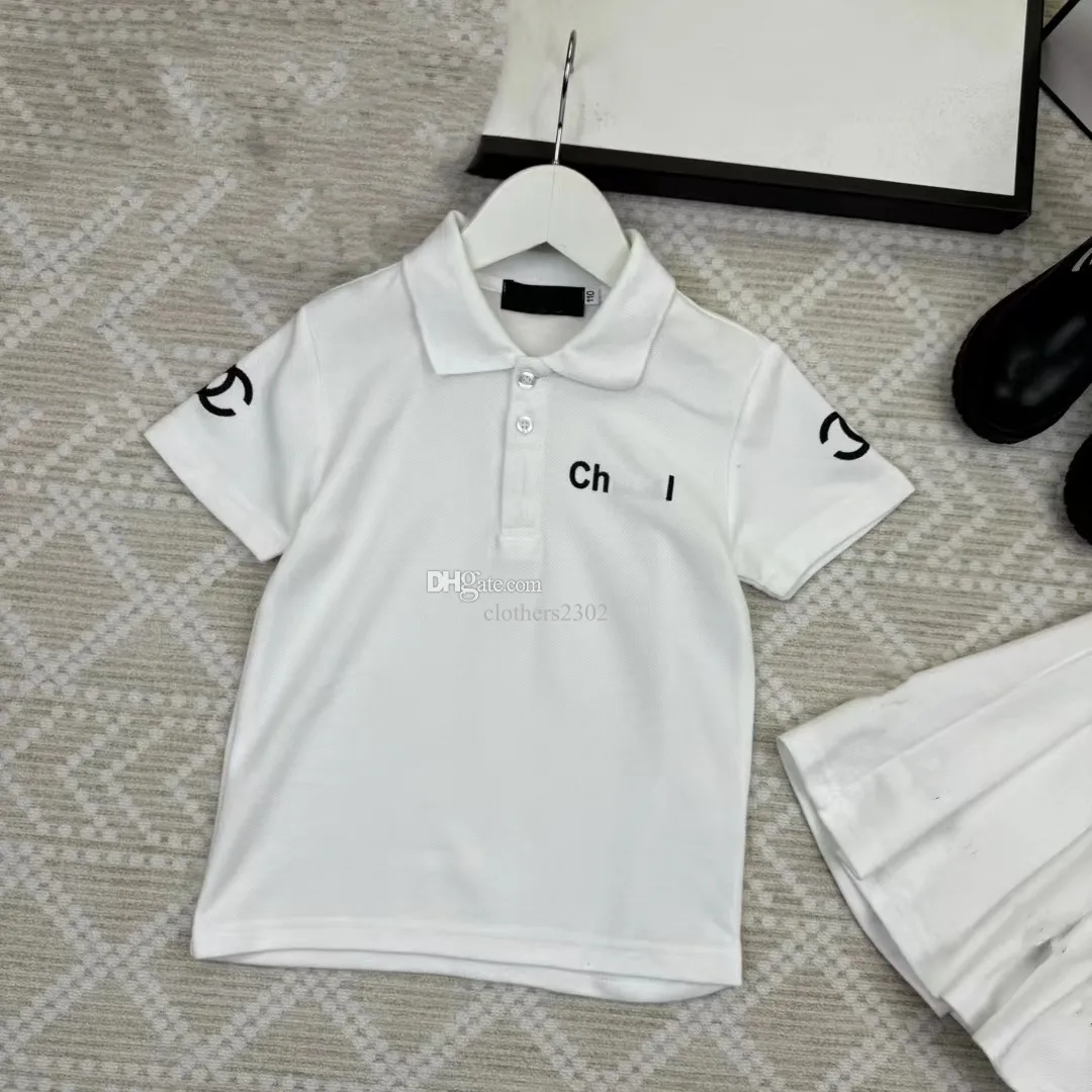 pojkar flicka polo sommar barn designer kläder baby polo skjorta fasion lapel krage logotyp på manschetter kort ärm klyvt skjorta topp märke tee 100% ren bomull