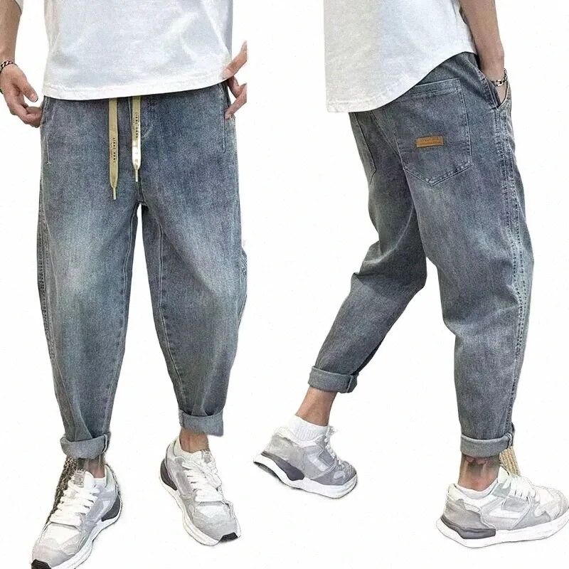 Vêtements de luxe coréens lâche cordon Denim sarouel pour hommes Vintage mer ceinture élastique Jeans Baagy Cargo pantalon hommes 11my #