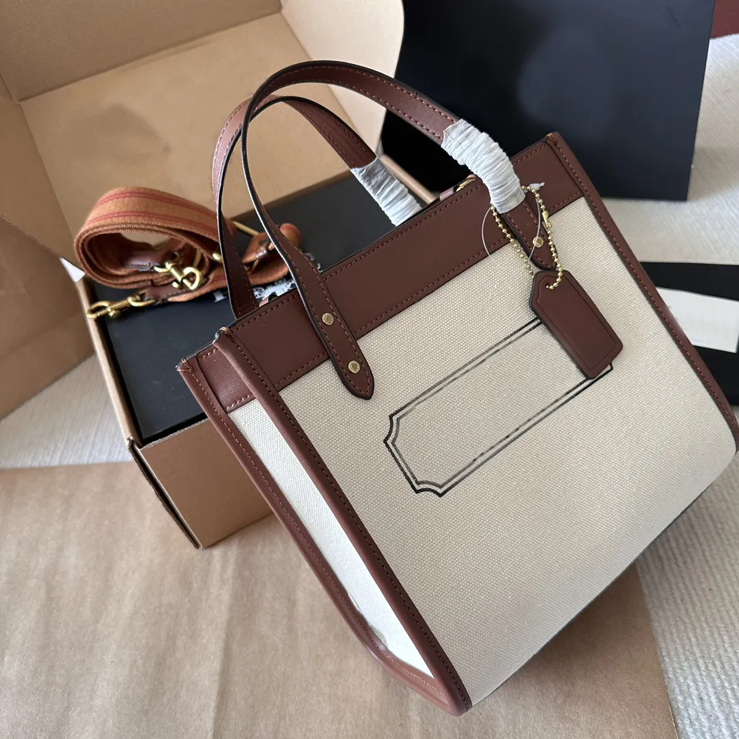 2024 Bolsa de designer nova moda de grande capacidade Bolsa de ombro de lona Crossbody Bag feminina bolsa mamãe bolsa de viagem curta bolsa de compras