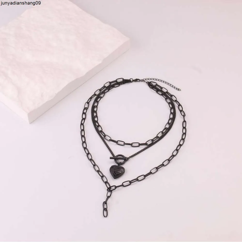 Smycken mörk vind svart kors persika hjärta dubbel lager halsband med kvinnlig minoritetsdesign mångsidig kedja