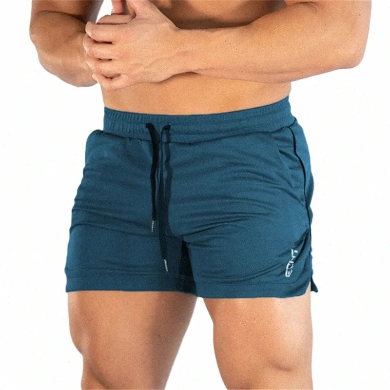 2024 NOWOŚĆ FITN Sports Shorts Man Summer Gyms trening Mężczyzna oddychający szorty z siatki Szybkie suche spodnie na plażę krótkie spodnie mężczyzn R8LH#