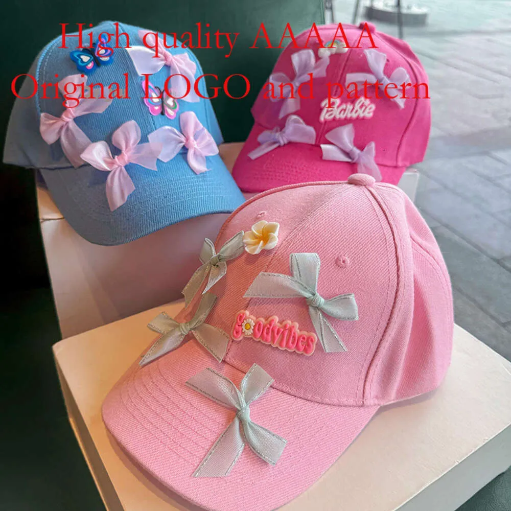 Dolce e fresco baseball piccante versione coreana viso appariscente set da ragazza con lingua d'anatra con fiocco con lettera di diamanti cappello a cilindro morbido trendy nuovo