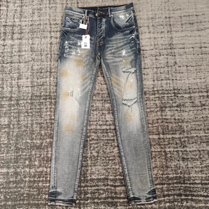 Mäns jeans modemärke rippade män mager casual byxor målade bläck