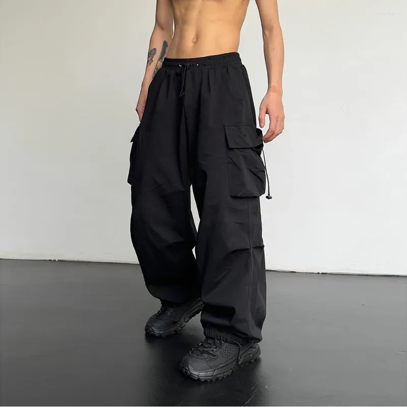 Herrbyxor vår sommar mode casual pannor för män streetwear fast färg last elastisk midja bred ben joggar
