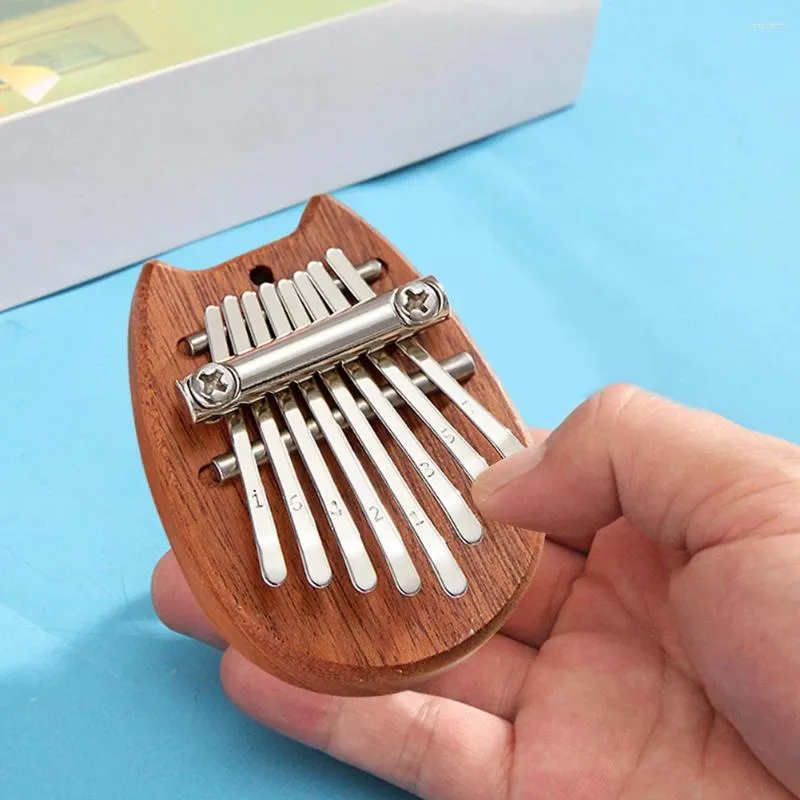 Estatuetas decorativas 8 teclas exercício kalimba instrumento musical bolso dedo prática retrô dedos piano presente requintado para crianças iniciantes