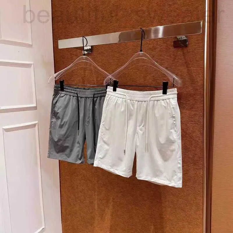 Projektant szortów męskich 2023SS Wang Jia'er Nowy klasyczny letni styl p Family Family Men's Men's Light Washing Shorts z pięcioczęściowymi spodniami 1mnm