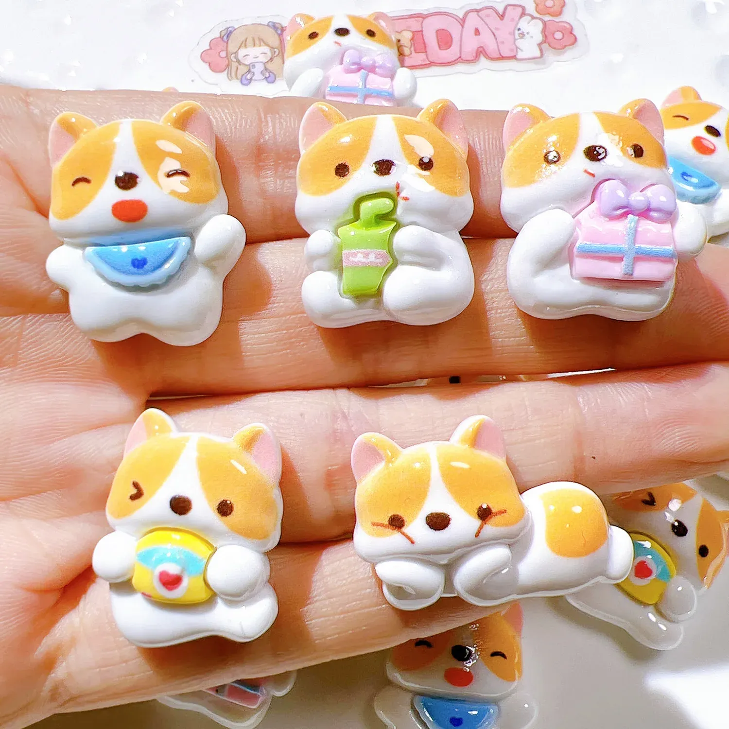 Miniatyrer 100 st kawaii söt tecknad hund flatback cabochon scrapbook diy tillbehör dekor figur hantverk