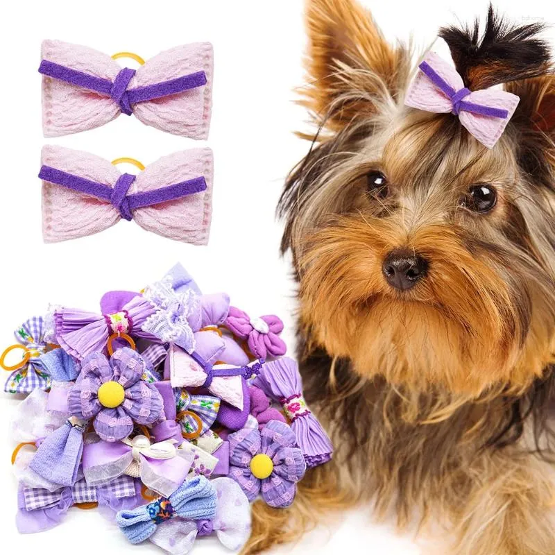 Vêtements de chien 20pcs Mode Pet Bows Purple Sweet Hair Bowknot pour petits chiens Chat Décorer Bandes de caoutchouc Produits pour animaux de compagnie