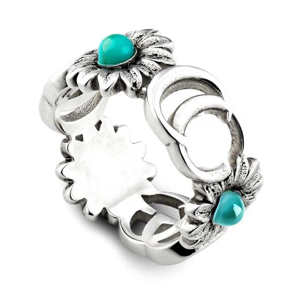 10% rabatt designer smycken dubbla blommor kvinnor och män turkos grön svart emalj älskar orädd silver älva låsande ring