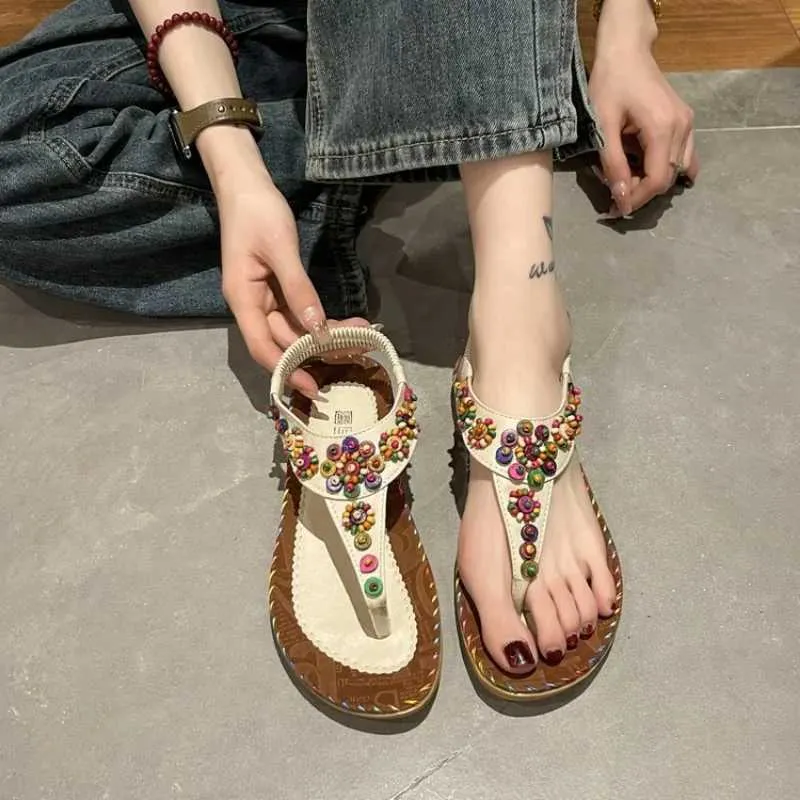 Sandaler Retro Bohemian pärlstavblommor Flat Heled Women Summer Open Toe Woman Elastic Strap Rom Shoes Sandalias Jer H240328