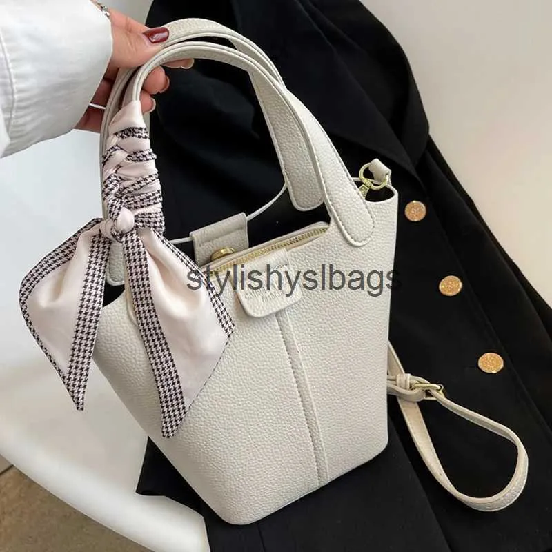 Cross Body Fashion Bow Sac à bandoulière de haute qualité en cuir souple de grande capacité Sac à bandoulière2022Women Designer Lychee Modèle Simple Fourre-tout H240328