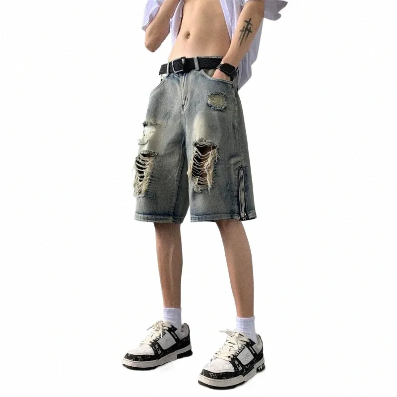 2024 Nouveaux hommes Summer Fi Ripped Holes Baggy Shorts Jeans Mâle Loose Denim Shorts Mens Streetwear Longueur au genou Pantalon court F73 T0np #