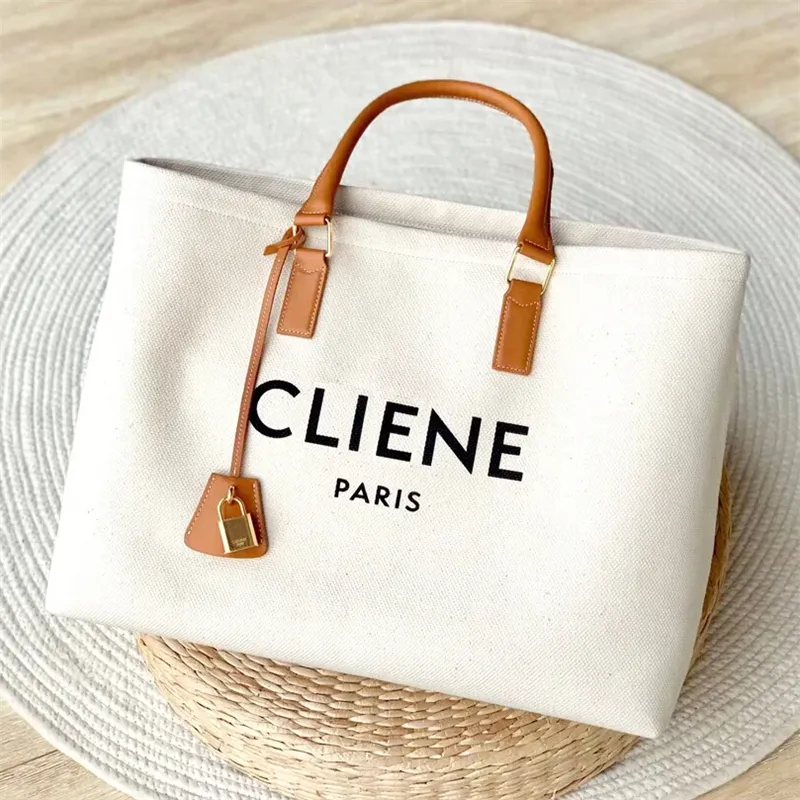 Poignée supérieure TRIOMPHES CANVAS grand sac de plage sac à main design épaule mère week-end sacs à couches pour femme hommes luxe embrayage bandoulière bagages sacs fourre-tout