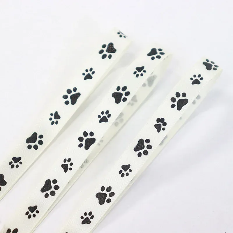 Tillbehör 100yarder 9mm svart bläck hunds tass yama singel ansikte satinband för diy förpackningsmaterial välkommen anpassad design