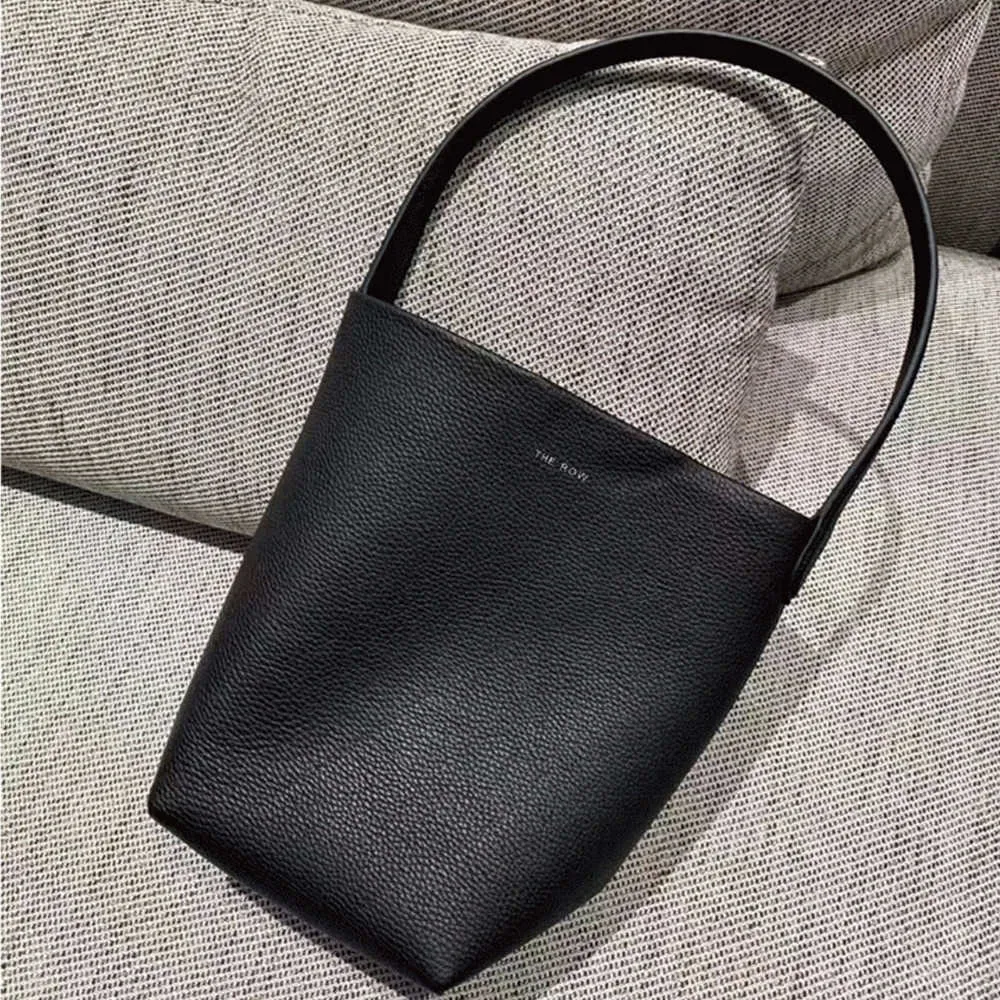 The Row Bucket Bag Small Medium And Large Tote Head Layer Made Of Natural Cowhide Simple And Large Capacity Single Shoulder Handbag For Women 240328 From 70 83 DHgate