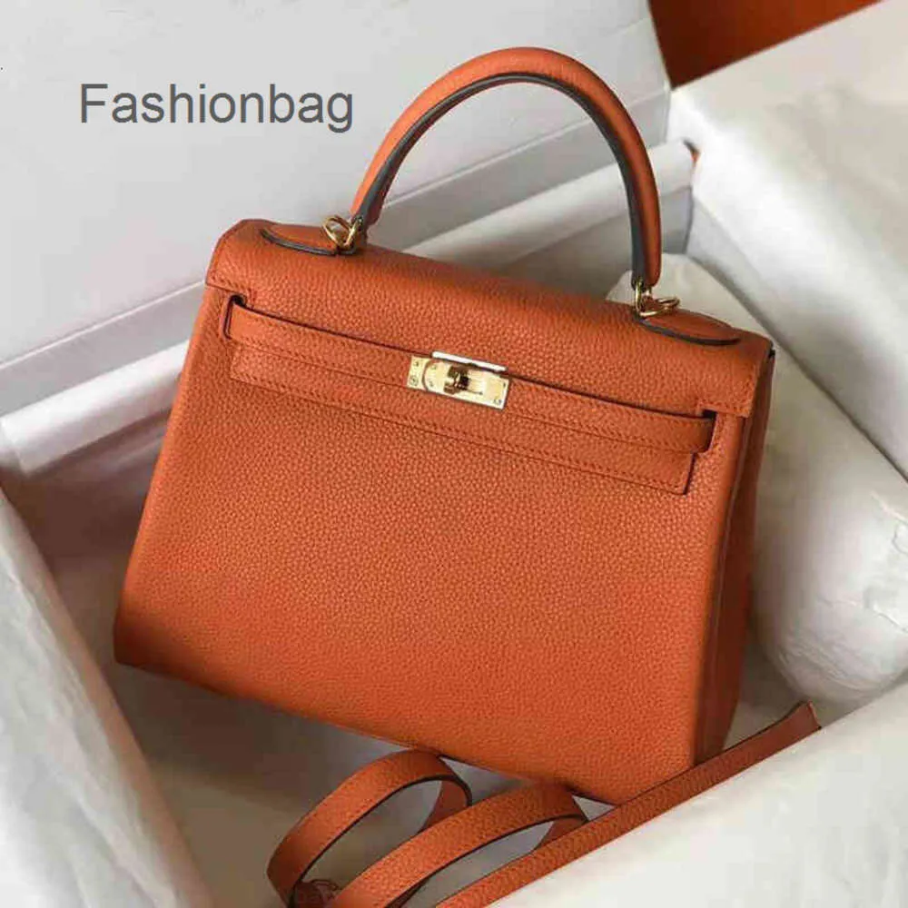 Designer Borse tote Borse Classico portatile Designer modello litchi Moda Togo Pelle di mucca Borsa versatile Borsa a spalla singola Fibbia da donna ftgy