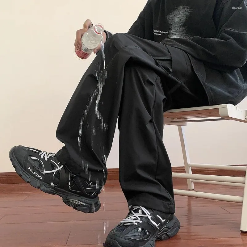 Pantalon pour hommes extérieur trois-défense composite avant printemps 2024 fonctionnel parachute cargo tendance lâche