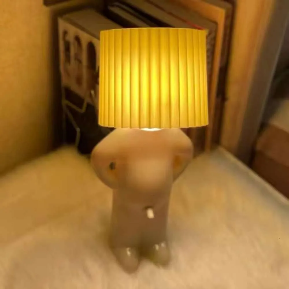 Nuova lampada da tavolo creativa Claeted Naughty Boy LED unica pieghe lettura illuminazione camera da letto comodino luce notturna regalo bambini