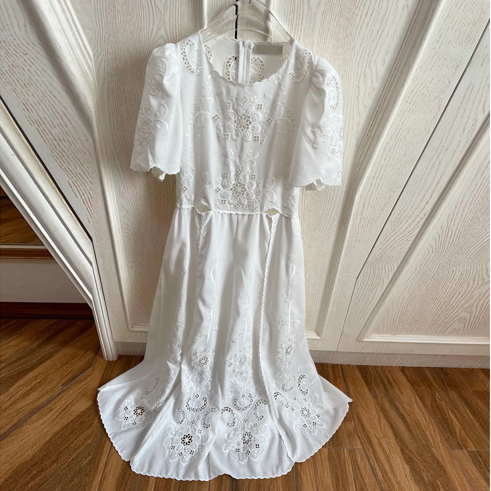 Womens white cotton blend midi dress with crew neck, short puff sleeves,  hollow out embroidery, and floral pattern from Dhgate Basic & Casual Dresses  - price 248.25