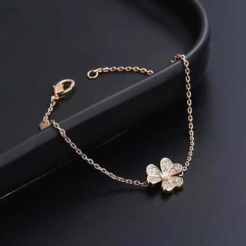 Designer Brand Original Van Four Leaf Grass Bijoux Femmes Trois Bracelet en diamant complet Simple Lucky Lumière Lutte avec logo