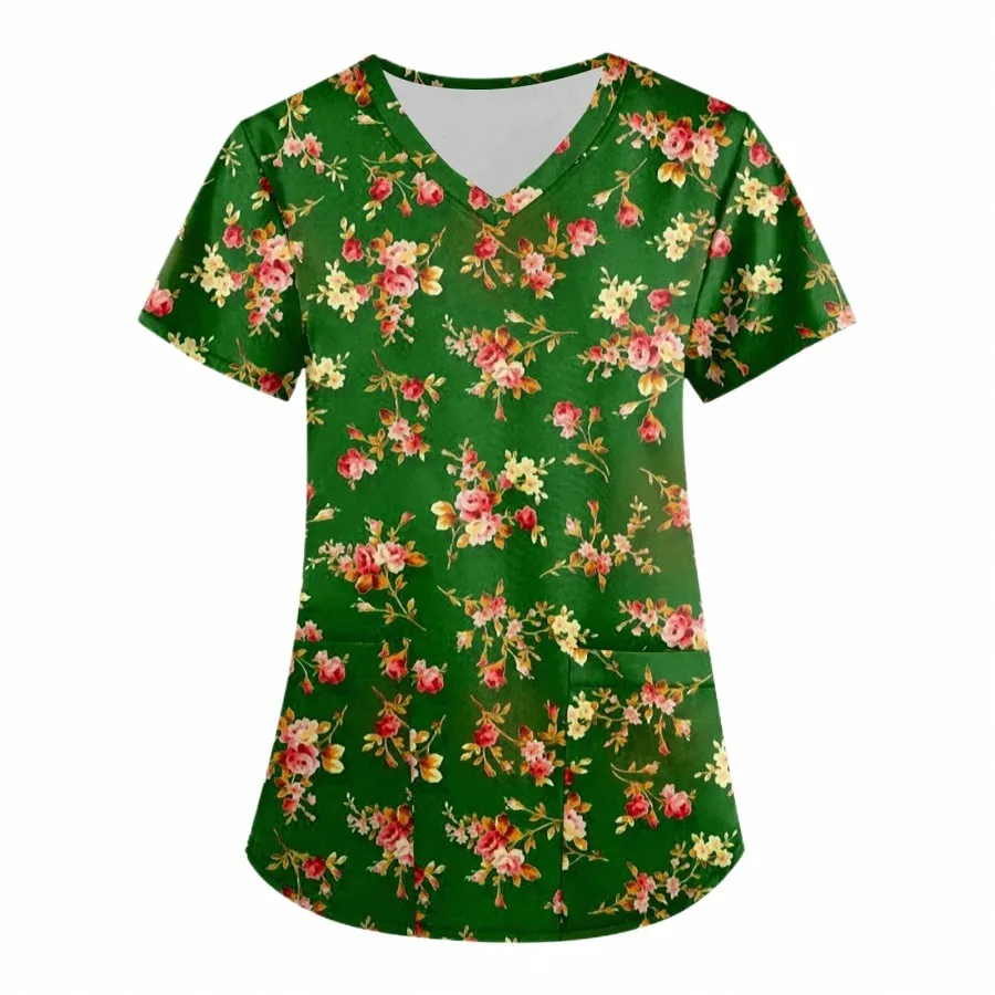 2023 nuova estate Dental Pet Shop abbigliamento da lavoro stampato modello colorato con scollo a V tasca infermieristica Scrub Top manica corta T-shirt N334 #