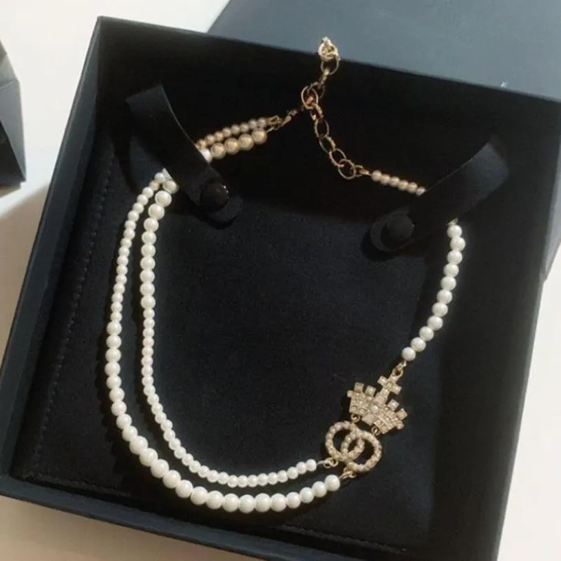 Dubbel Pearl Necklace Womens Jewelry Designer Crown Pendant Necklace Luxury C Högkvalitativ klassisk modehalsband Kolkedja 3025