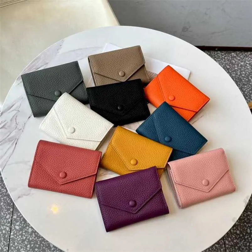 Coin Purses Guangzhou Womens 2024 New Genuine Leather 30% Money Clip Layer Cowhide coin purses Wallet Versatile Trendy Short Style Small Card Bag