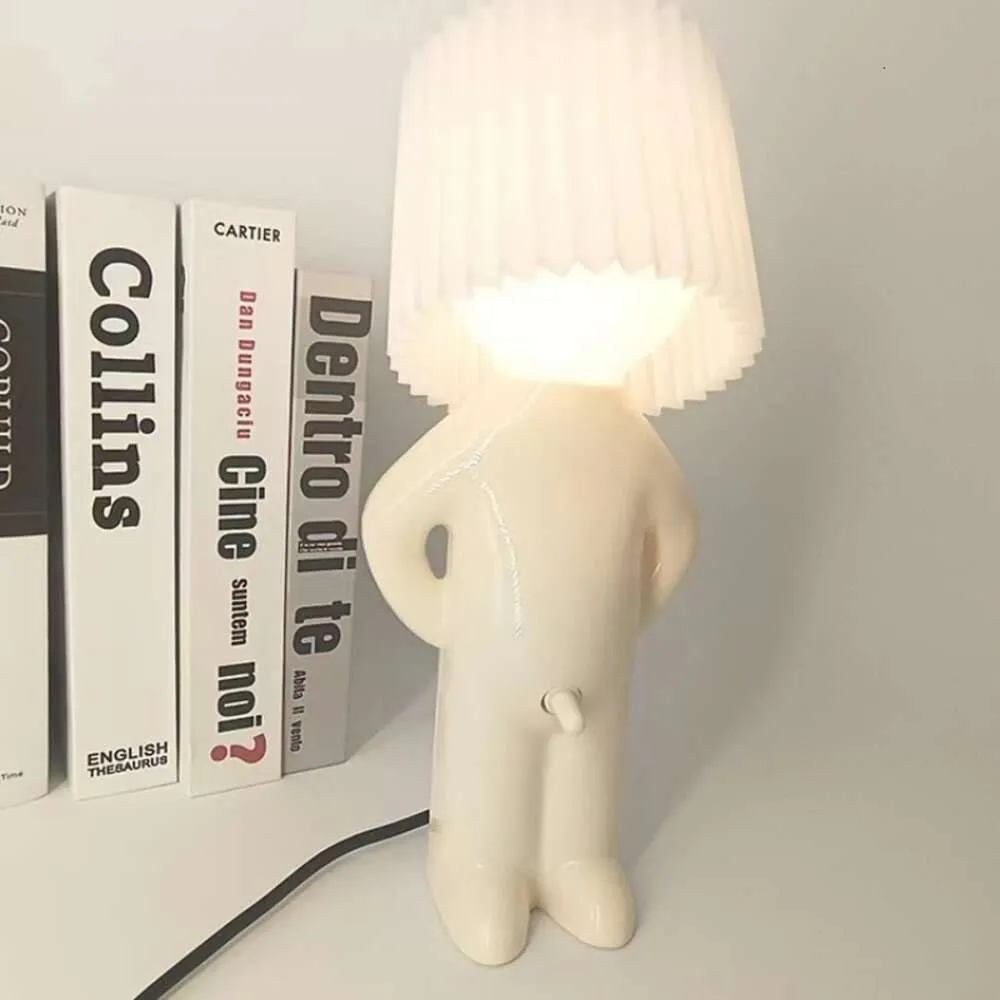 Nuova lampada da tavolo creativa Claeted Naughty Boy LED unica pieghe lettura illuminazione camera da letto comodino luce notturna regalo per bambini