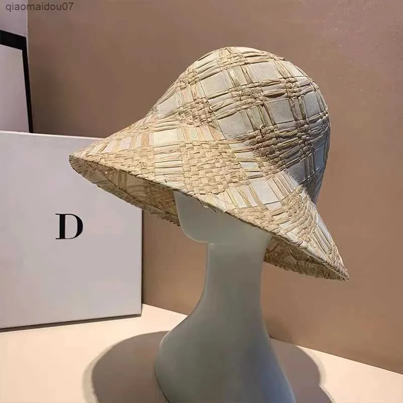 Wide Brim Hats Bucket Hats 2023 New Raffia Bucket Womens Folding Sun UV Hat Designer Luxury Hooked Beach Hat Handmade Fashion Straw HatL2403