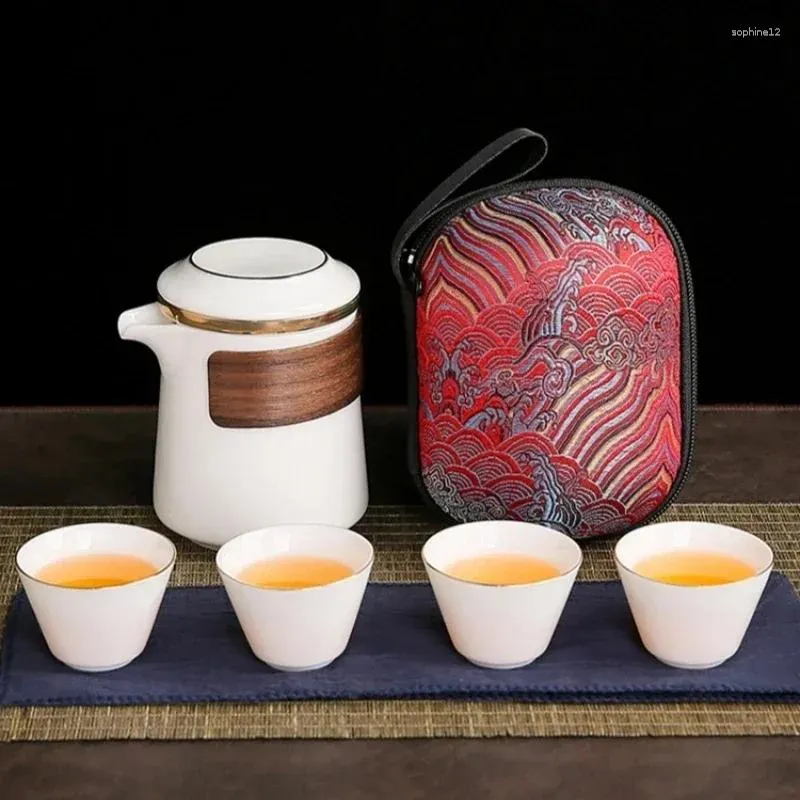 Teaware set vita porslinskoppar 1 kruka 4 kopp mugg ceremoni tekanna kinesisk bärbar resesats keramik med väska