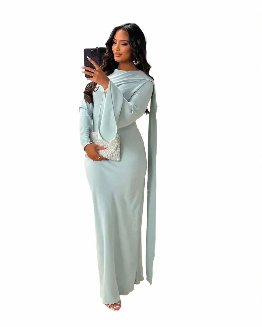 slim fit dress slacks Madeleine | Black Fishtail Maxi Dress with Bardot Mesh Long Sleeves main image 0