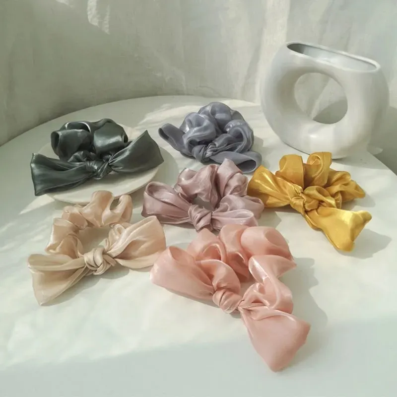 Pearlescent SyTrAtine Hair Ring Super Fairy Ribbon Bowknot Hair Prydament Kvinnor Enkelt temperament läderband bundet hårflicka koreansk huvudrut