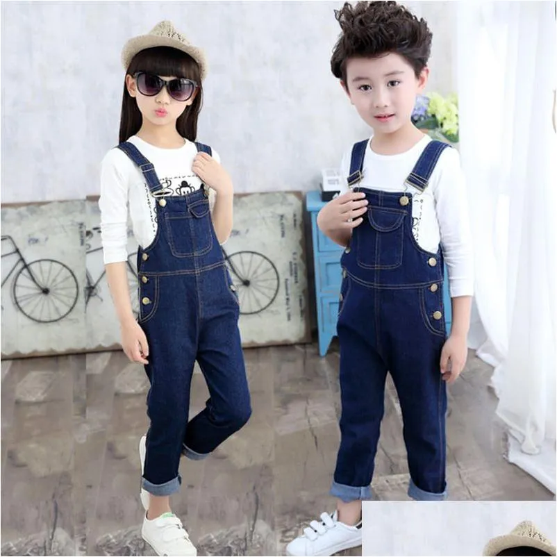 Jumpsuits Kids Denim Overalls voor tieners 4-13 jaar Lente tuinbroek Meisjes Pocket Jumpsuit Kinderen Jongensbroeken Kinderjeans Drop Dhklk