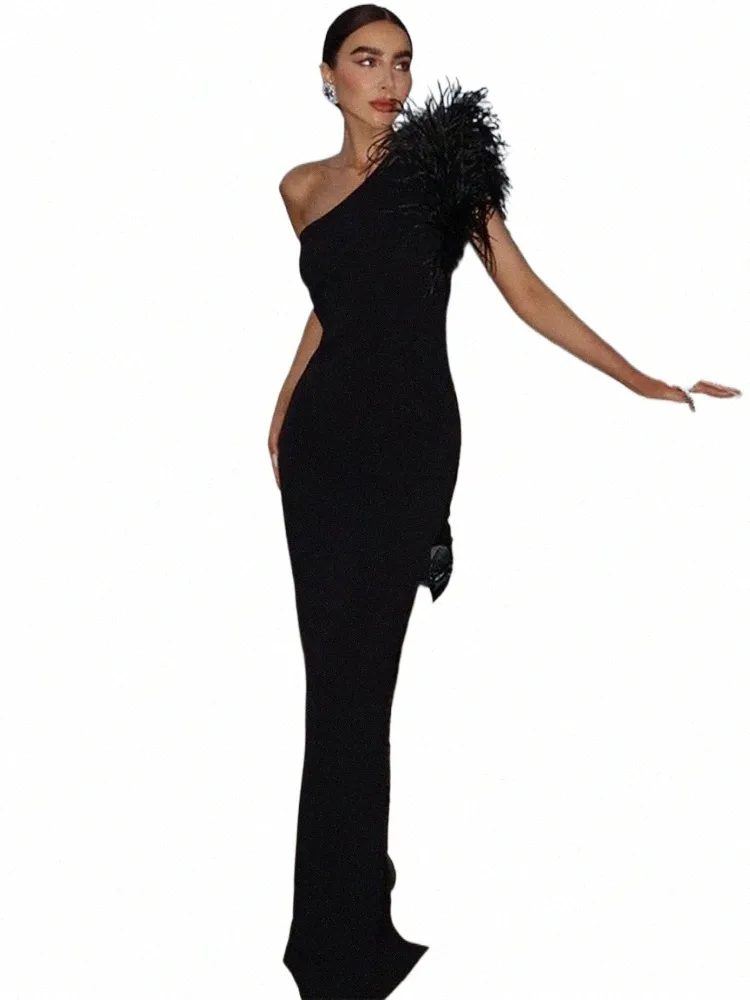 black feather maxi dress Valor Black Asymmetric Maxi Dress With Feather Trim – Club L London