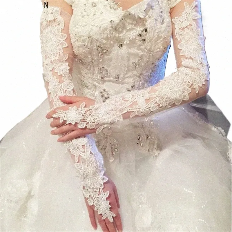 قفازات زفاف من Nixuanyuan Bride Hollow Lace Hluves قفازات الزفاف البيضاء العاج في إصبع الزفاف 2023 66NB#