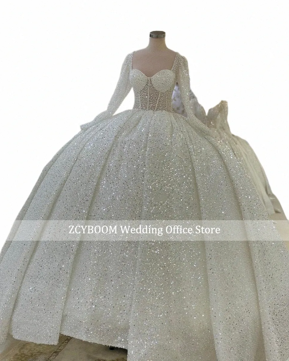 럭셔리 두바이 스파클 진주 구슬로 된 왕자 웨딩 드레스 2024 lg 슬리브 연인 볼 가운 신부 가운 멍청이 de noiva q9nc#