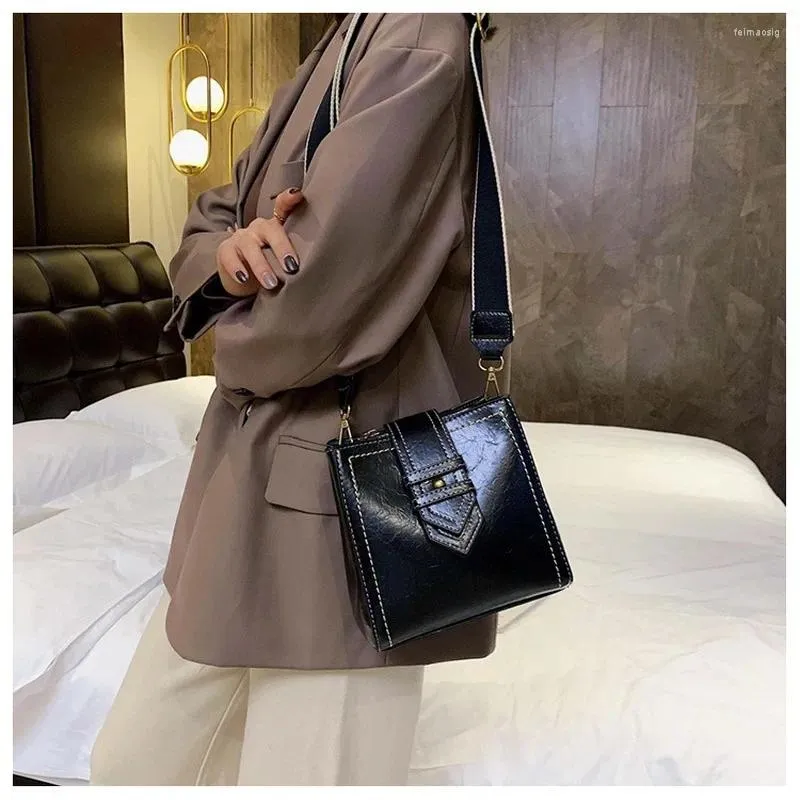 Drawstring 2024 Female Bag Fashion European And American Messenger Wide Shoulder Strap Belt Buckle Bucket Simple