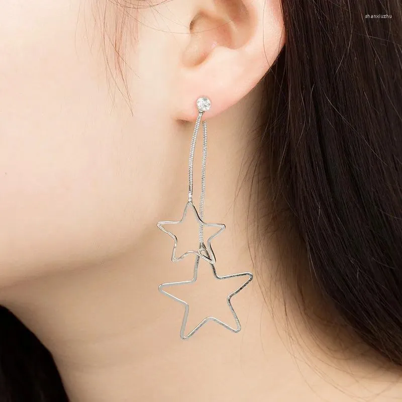 Boucles d'oreilles étoiles étoiles pentagonales avec tempérament à la mode et conception personnalisée Fil d'oreille asymétrique