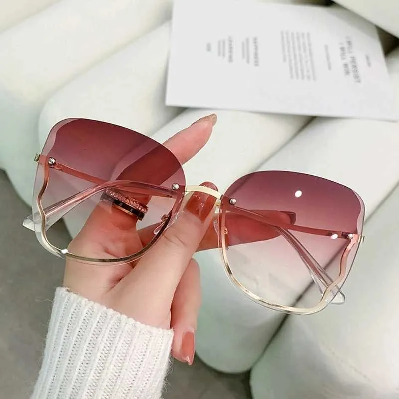 Sunglasses 2023 Luxury Brand Design Borderless Womens Sunglasses Sexy Sunglasses Gradient Shadow Girls Sports Sunglasses J240330