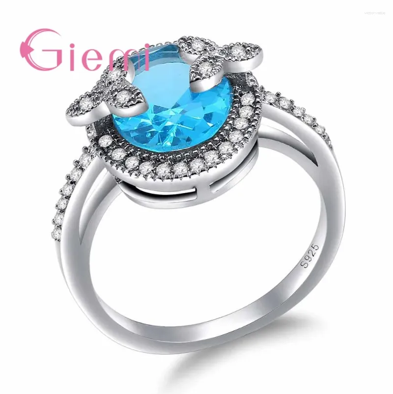 Anillos de racimo Joyería de compromiso romántica Venta de anillo de plata esterlina 925 para mujeres Luz Azul Claro Zircon Redondo al por mayor