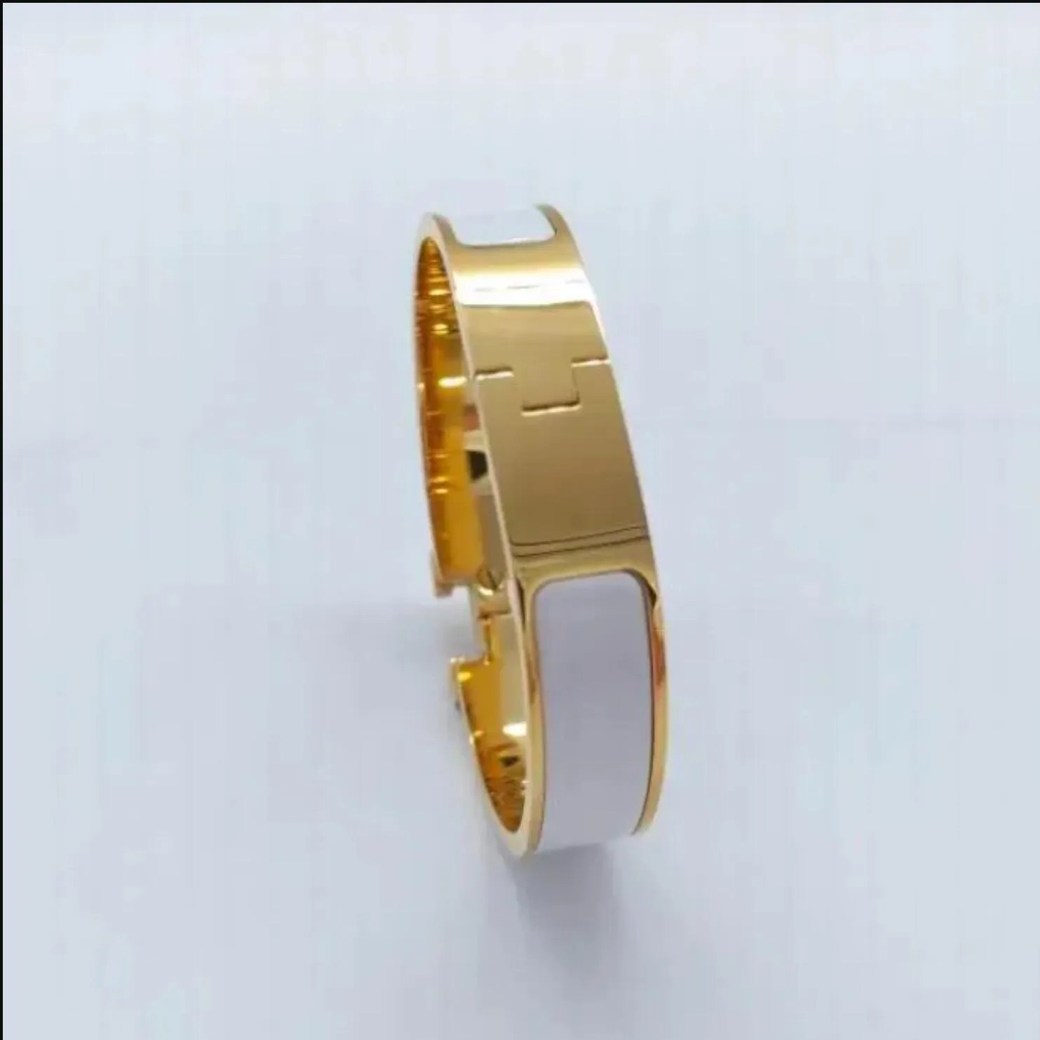 Diseñador clásico de 12 mm de ancho pareja de moda de oro diseñadores brazaletes para mujeres y hombres sier alta calidad 316l joyería de acero de titanio