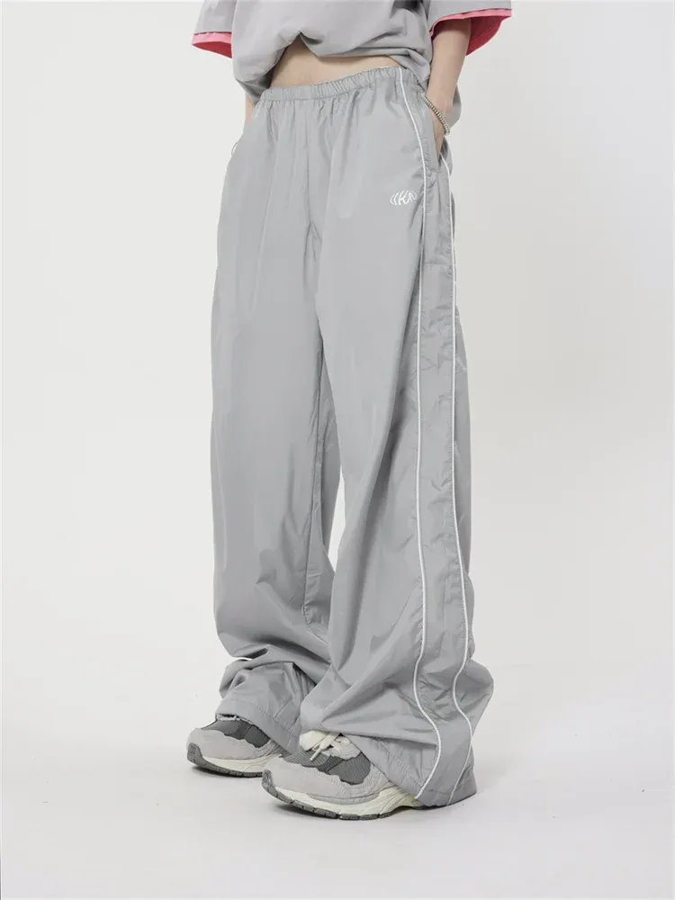 [ NERDY ]★24FW★韓国人気★WOMEN'S VELOUR TRACK PANTS Dolls Kill x Bratz Rhinestone Logo Velour Track Pants - Brown