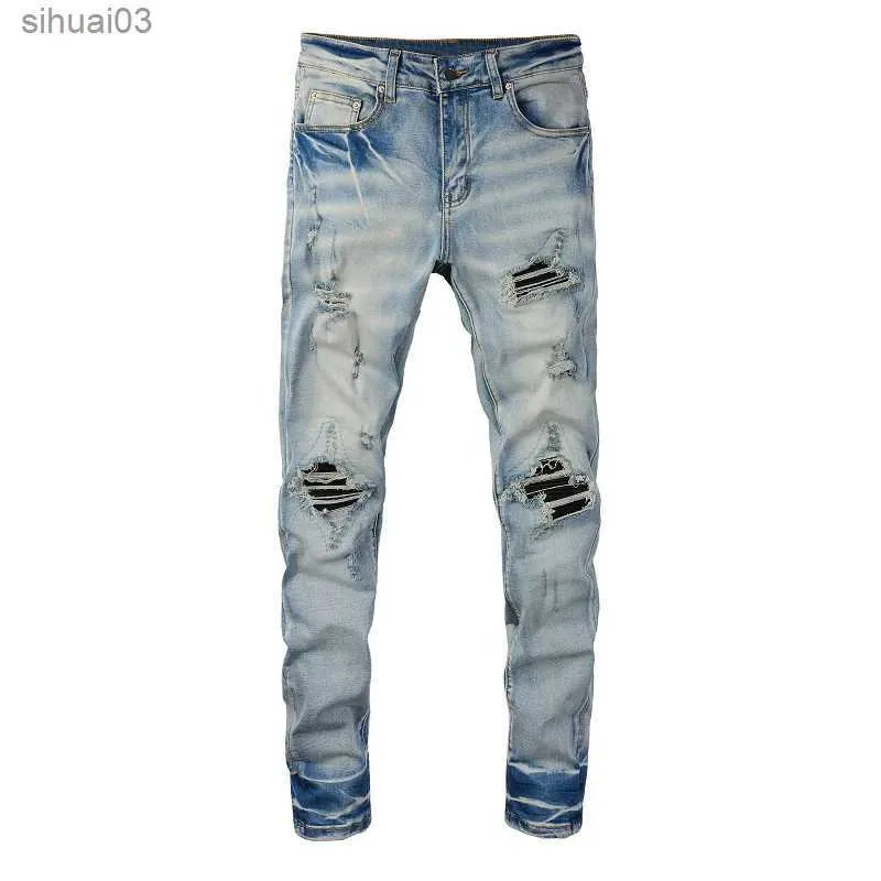 Mäns jeans män knäckt läder veckad lapp cykla jeans gata kläder elastiska denim leggings hål tårar smärtade byxa2403